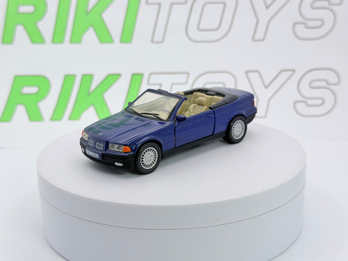 BMW 325 i Cabrio E36 Cararama 1/43 Blu