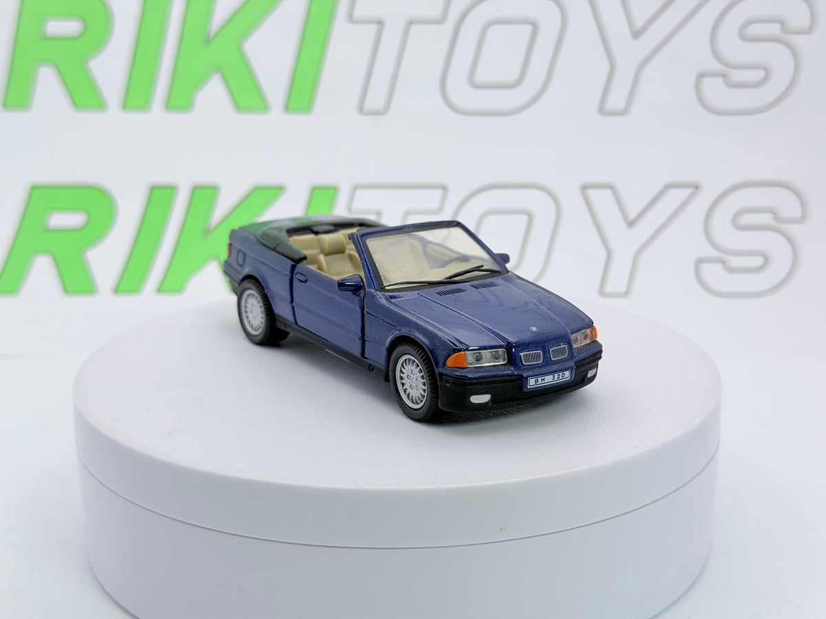 BMW 325 i Cabrio E36 Cararama 1/43 Blu