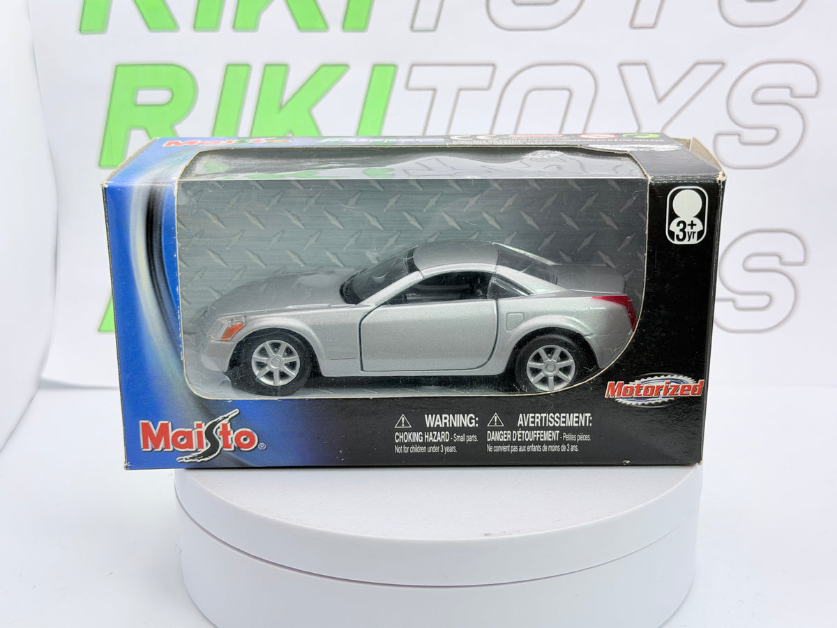 Cadillac Evoq Coupé Maisto 1/40 Argento