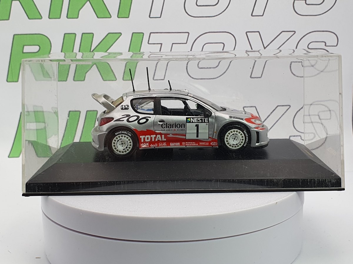 Peugeot 206 WRC IXO 1/43 Argento 2001 - RikiToys - IXO
