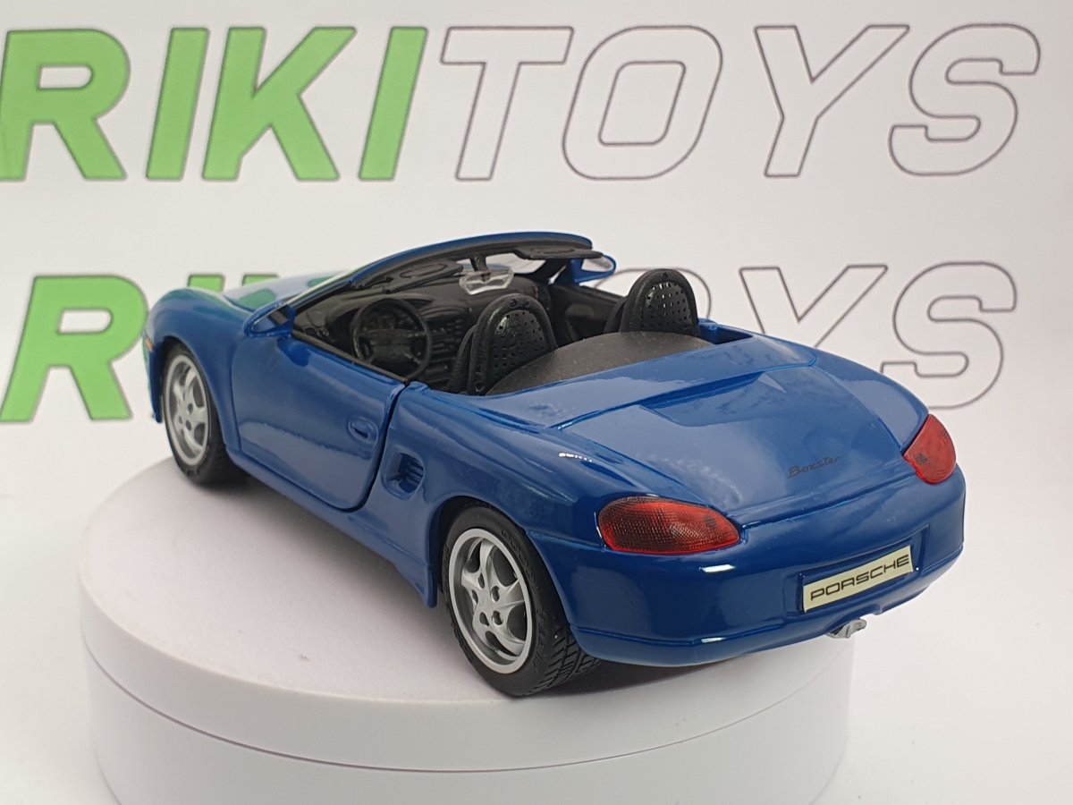 Porsche Boxster Maisto 1/24 Celeste 1997 - RikiToys - Maisto