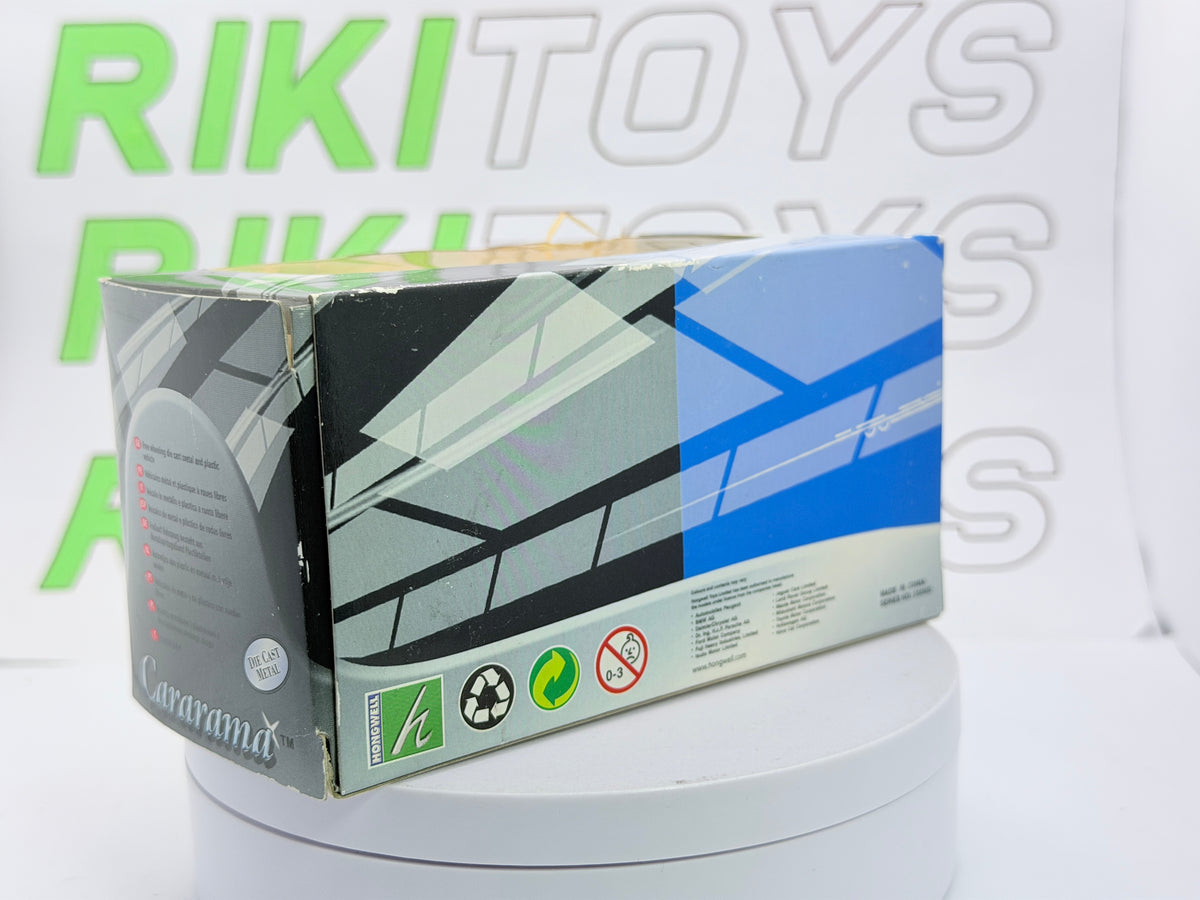 Mitsubishi Pajero Revolution Cararama 1/43 Giallo