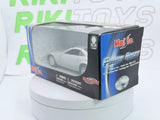 Cadillac Evoq Coupé Maisto 1/40 Argento