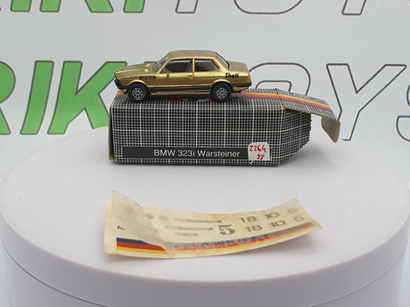 BMW 323i E21 Herpa 1/87 Oro - RikiToys - Herpa