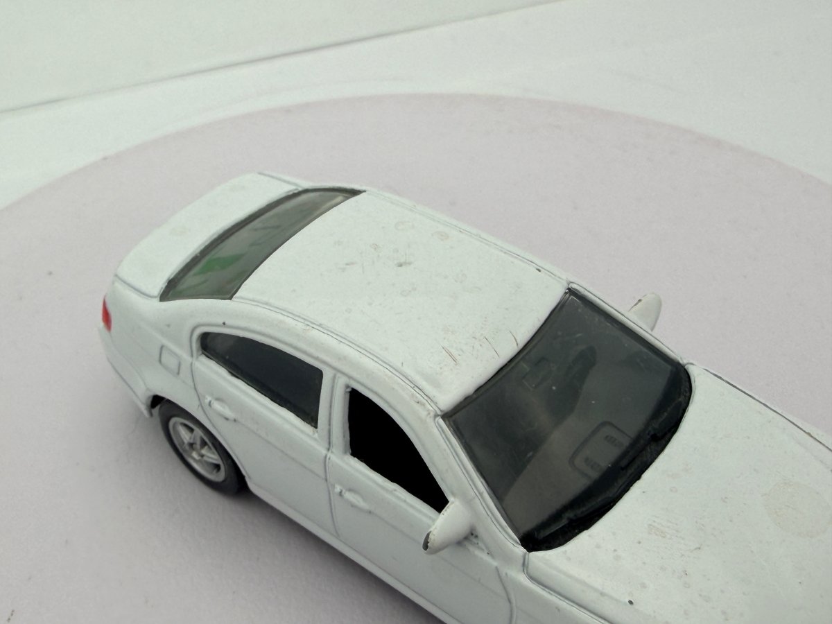 BMW 330 i Welly 1/55 Bianco - RikiToys - Welly