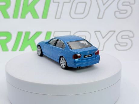 BMW 330i Welly 1/43 Blu - RikiToys - Welly