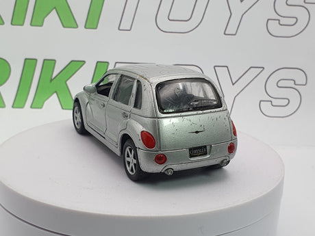 Chrysler Pt Cruiser Maisto 1/39 Argento 2000 - RikiToys - Maisto