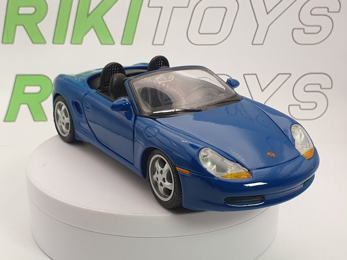 Porsche Boxster Maisto 1/24 Celeste 1997 - RikiToys - Maisto