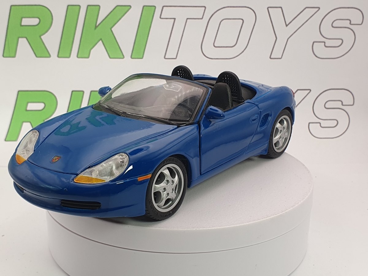 Porsche Boxster Maisto 1/24 Celeste 1997 - RikiToys - Maisto
