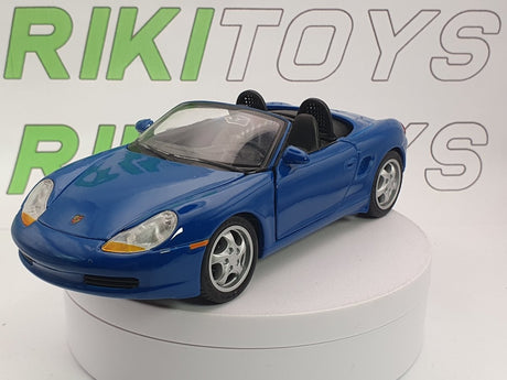 Porsche Boxster Maisto 1/24 Celeste 1997 - RikiToys - Maisto